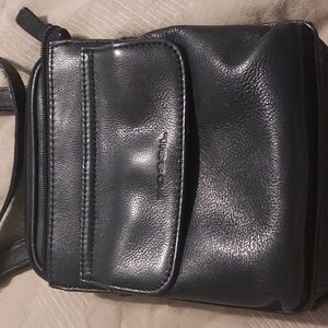 A black leather Fossil purse